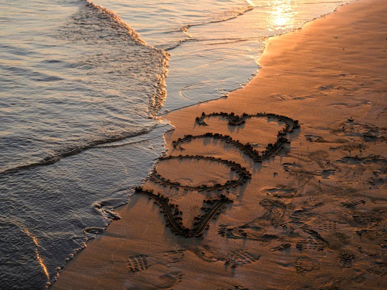 2023 Writing on the Sand at the beach