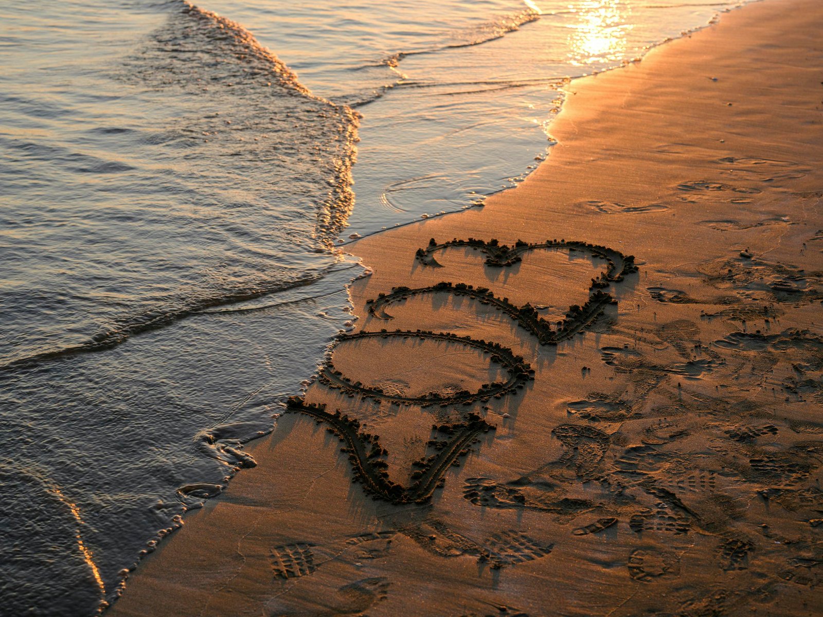 2023 Writing on the Sand at the beach