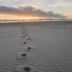 Foot Prints in Gray Sand