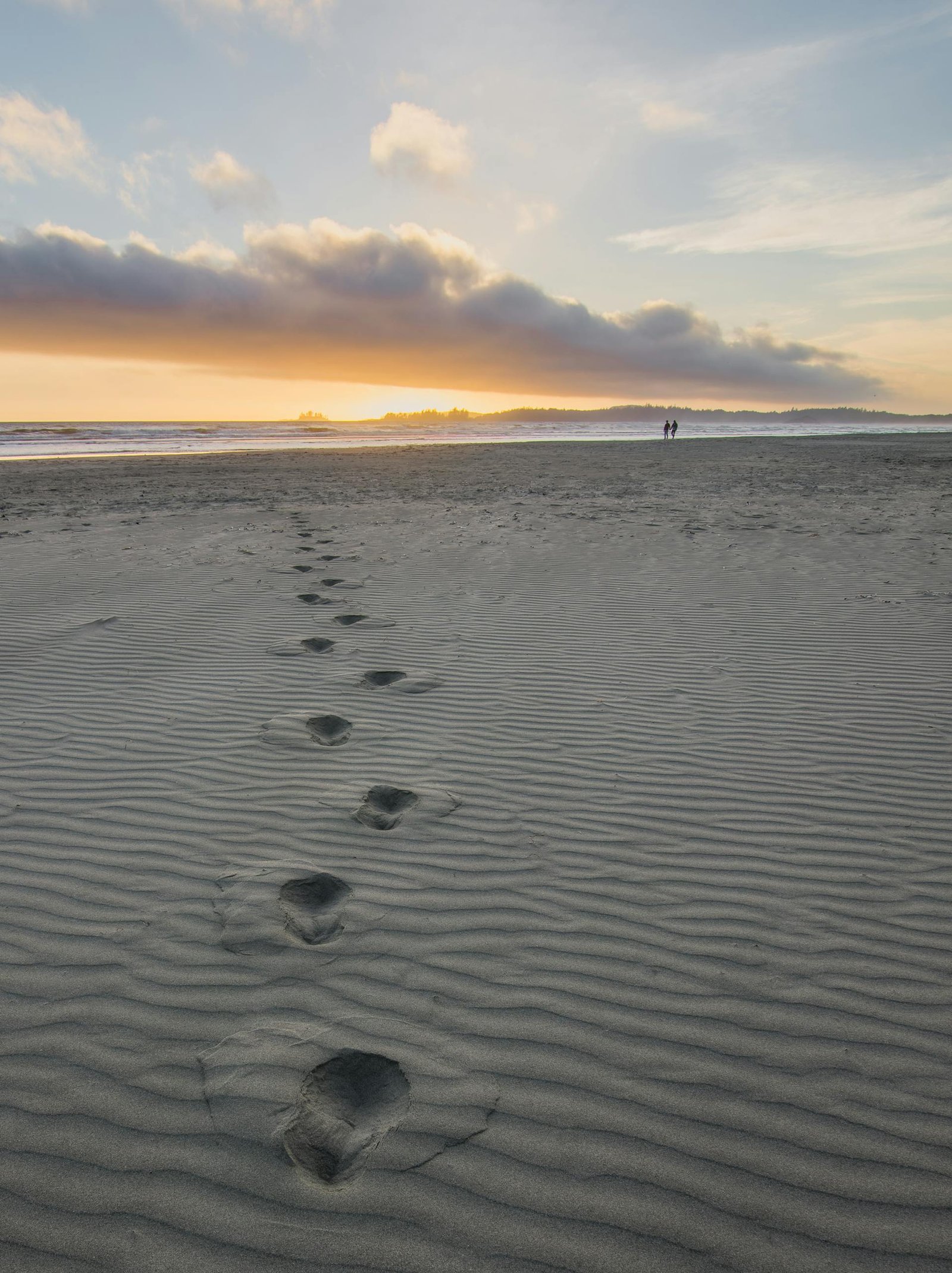 Foot Prints in Gray Sand