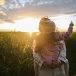 Mother and Daughter on Grass